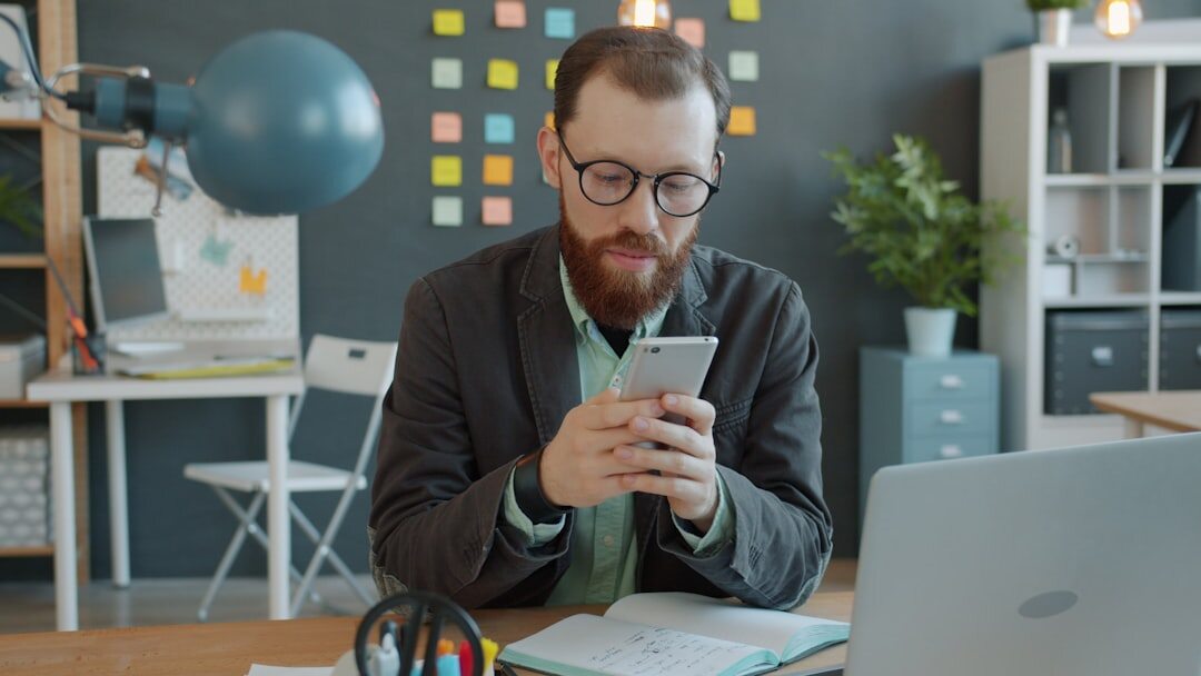 Technology workspace with laptop and smartphone in modern office